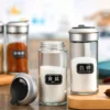 Ha9bd93ab581c4da099e06e6e1a0ba040v.webp Dropshipping Glass Spice Bottles with Plastic Lids Rotating Multi-hole Shakers Pepper/salt Wholesale Kitchen Supplies in Stock