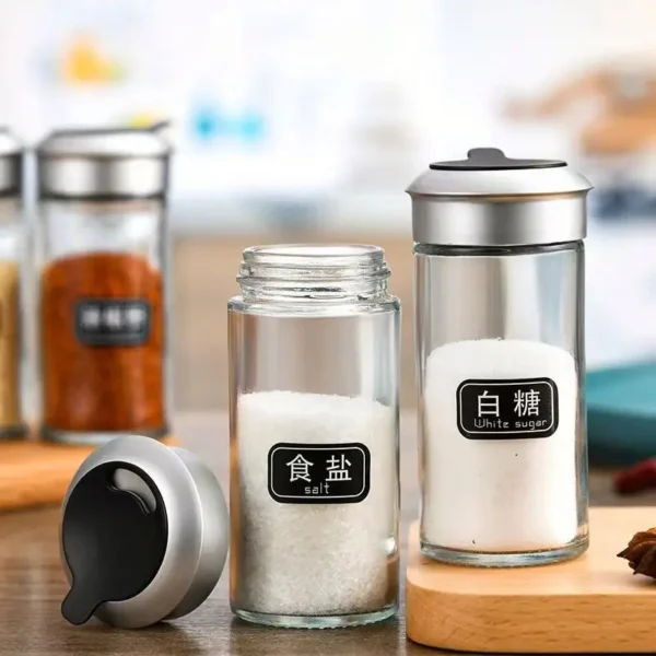 Ha9bd93ab581c4da099e06e6e1a0ba040v.webp Dropshipping Glass Spice Bottles with Plastic Lids Rotating Multi-hole Shakers Pepper/salt Wholesale Kitchen Supplies in Stock