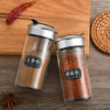 Hfbb2da3a8c3e49a281a6612cb96d27bbc.webp Dropshipping Glass Spice Bottles with Plastic Lids Rotating Multi-hole Shakers Pepper/salt Wholesale Kitchen Supplies in Stock